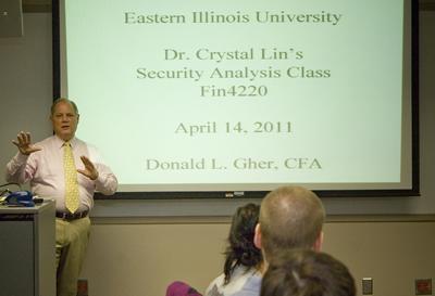School of Business alumnus Mr. Donald L. Gher speaks to a finance class.